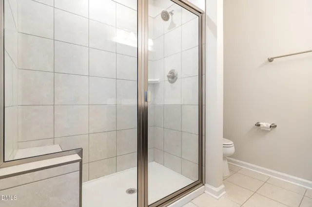 a bathroom with a sink a mirror and a shower