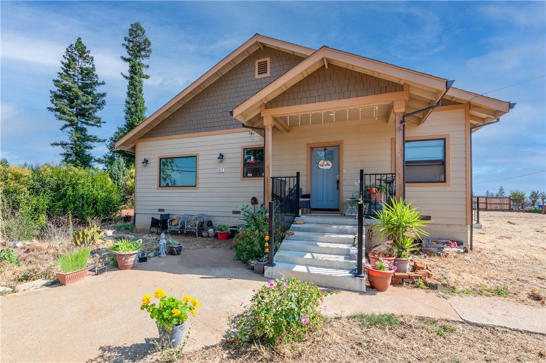 5412 South Libby Road Paradise, CA 95969 - Photo 1 of 1 a front view of a house with a yard