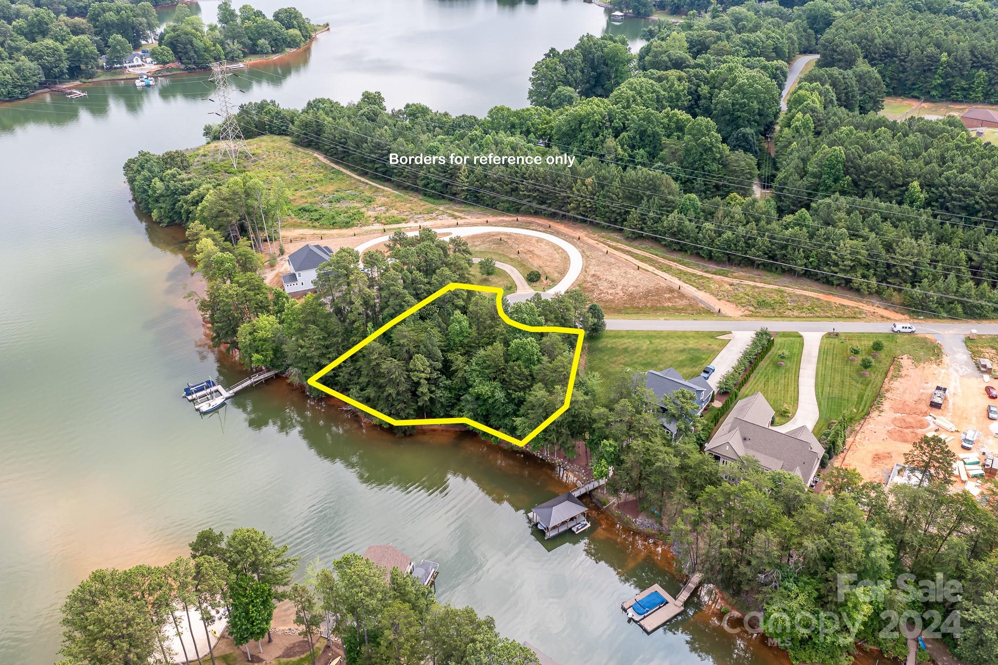0 Rivendell Road, Unit 2 Denver, NC 28037 - Photo 2 of 11 an aerial view of a house with a yard and lake view