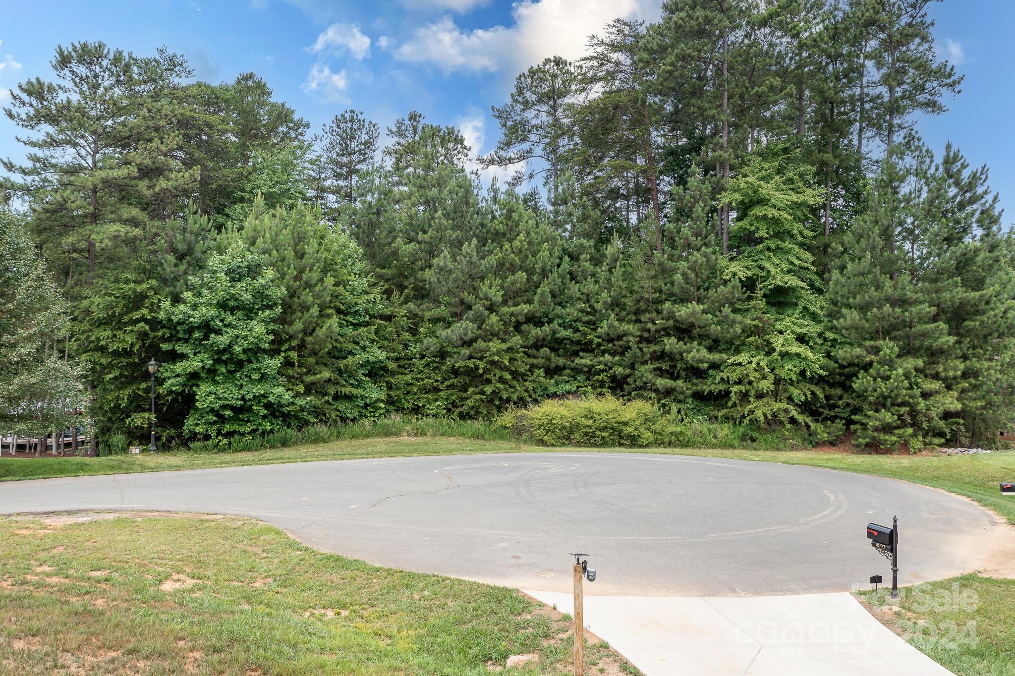 0 Rivendell Road, Unit 2 Denver, NC 28037 - Photo 9 of 11 a view of a yard with a tree