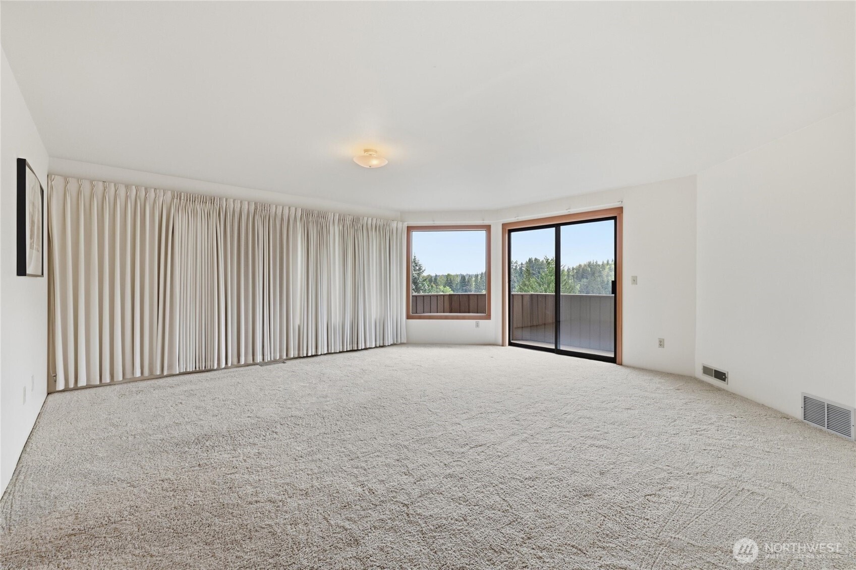 9520 Odin Way Bothell, WA 98011 - Photo 14 of 40 an empty room with windows