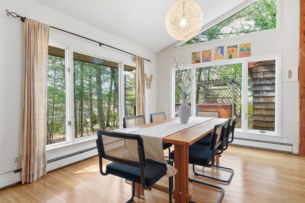 30 Volunteer Way Lexington, MA 02420 - Photo 11 of 41 a view of a dining room with furniture window and wooden floor