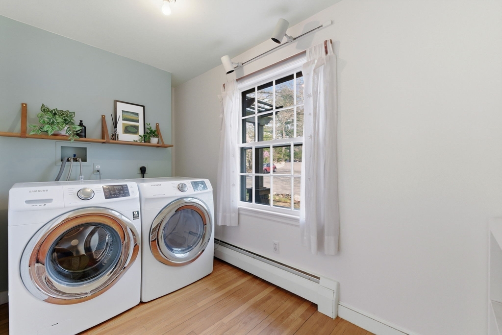 30 Volunteer Way Lexington, MA 02420 - Photo 16 of 41 a utility room with dryer and washer