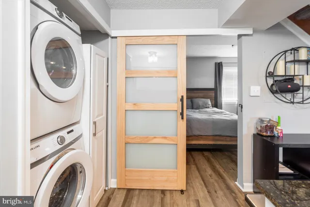 a bedroom with a bed and with closet