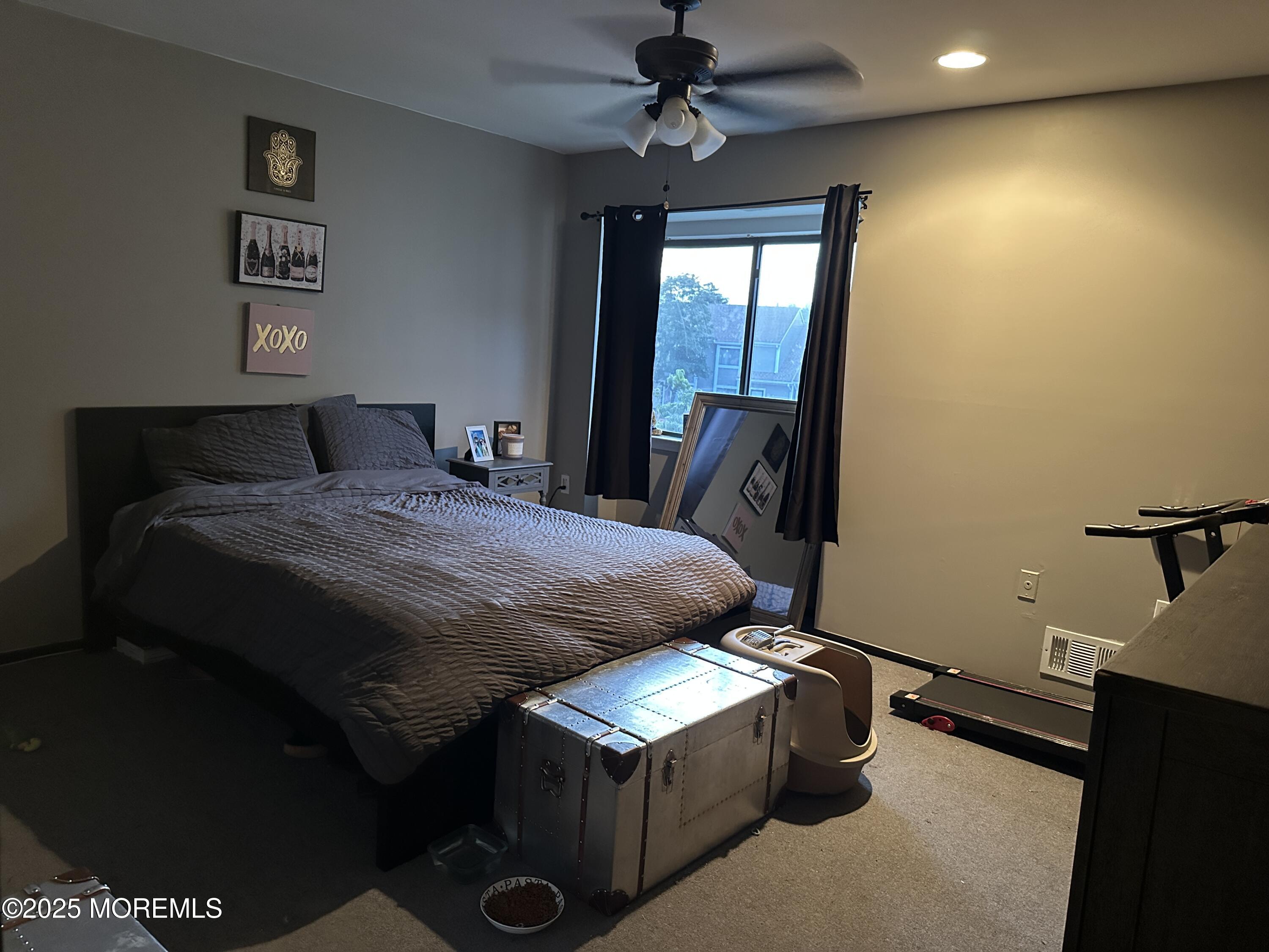 619 Sandra Place Brick, NJ 08724 - Photo 16 of 19 a bed sitting in a bedroom next to a window