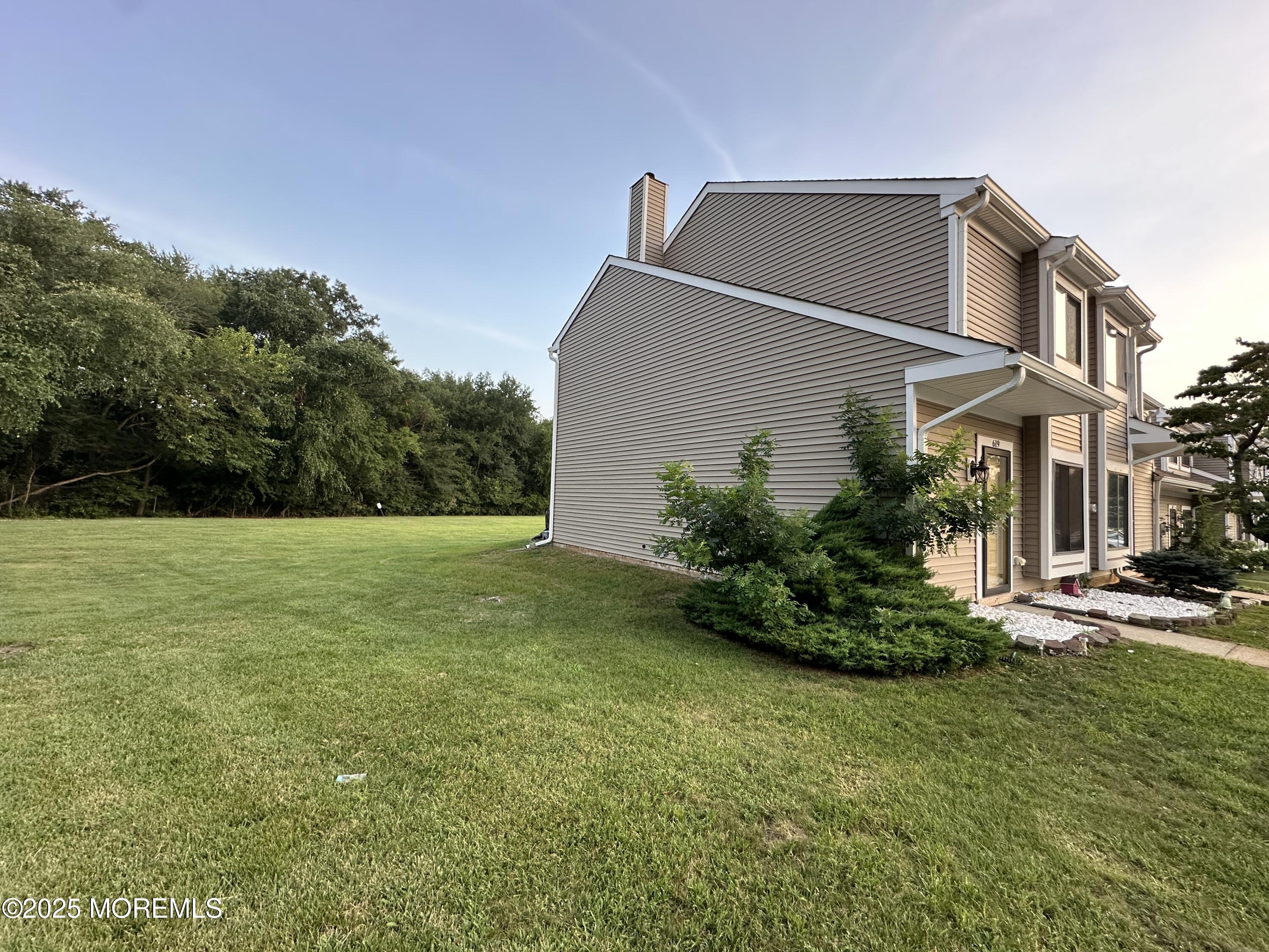 619 Sandra Place Brick, NJ 08724 - Photo 3 of 19 a view of a house with a yard