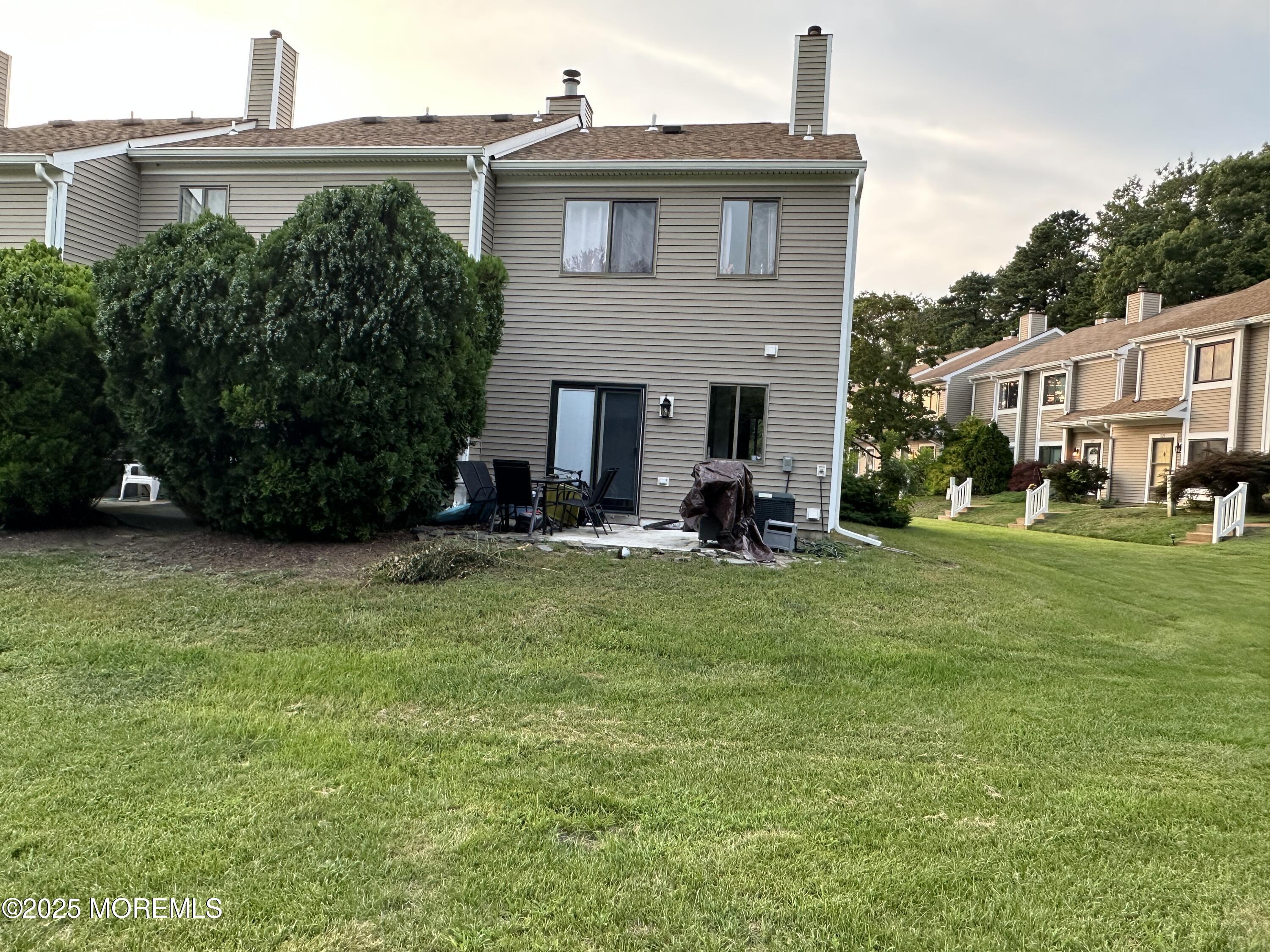 619 Sandra Place Brick, NJ 08724 - Photo 6 of 19 a view of a house with a backyard