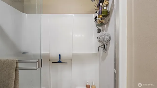 a bedroom with two beds and painted walls