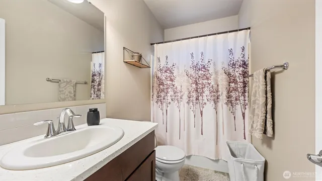 a bedroom with a bed and furniture