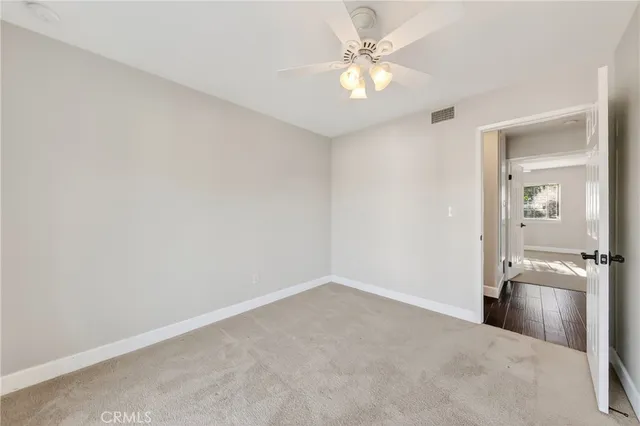 an empty room with a bathroom