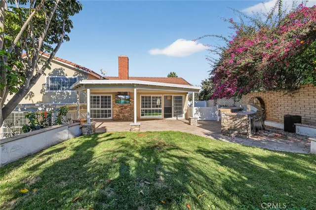 a front view of a house with patio