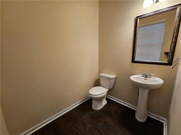 a bathroom with a sink and a toilet