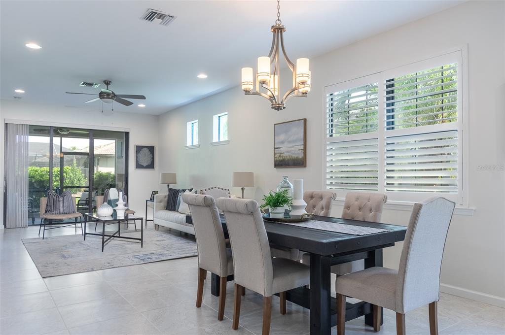 12209 Marsh Pointe Road Sarasota, FL 34238 - Photo 10 of 42 Living Space Flows Effortlessly to Lanai