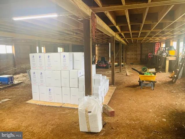 a view of room with window and hardwood floor