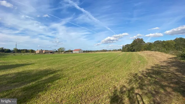a kitchen with stainless steel appliances granite countertop a refrigerator sink and stove