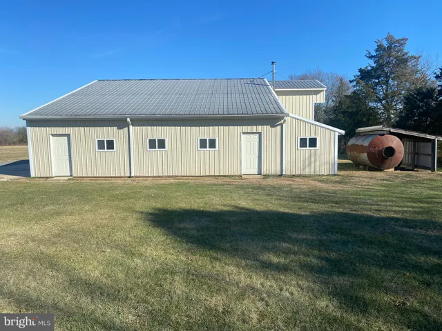 a view of a livingroom with wooden floor