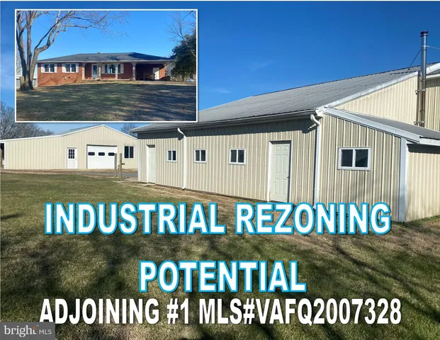 a view of a lake with a building in the background