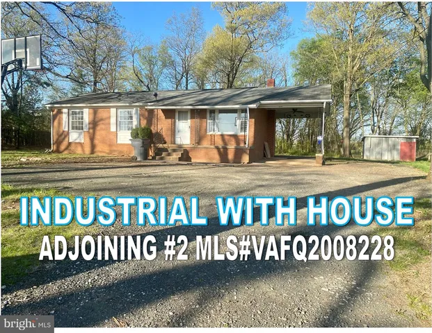 a view of a big yard with a house