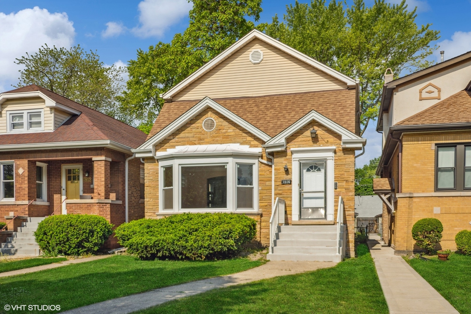 1816 North Nordica Avenue Chicago, IL 60707 - Photo 1 of 23 a front view of a house with a yard