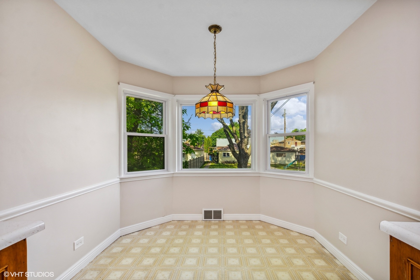 1816 North Nordica Avenue Chicago, IL 60707 - Photo 9 of 23 a workspace room with windows and ceiling fan