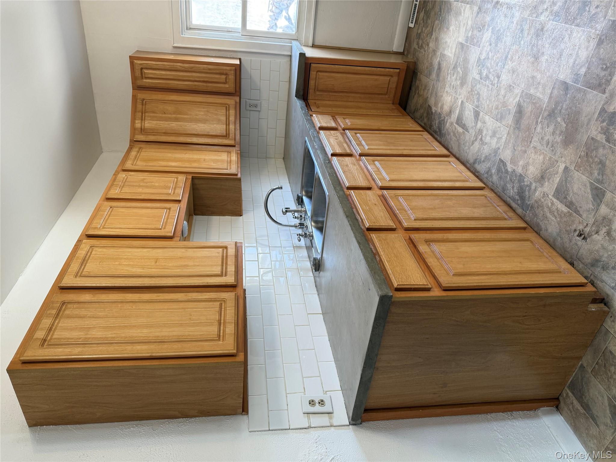 657 Eatontown Road Port Jervis, NY 12771 - Photo 4 of 14 a kitchen with stainless steel appliances granite countertop a sink dishwasher stove and cabinets