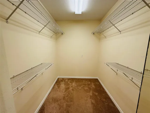 a view of a room with racks on the wall