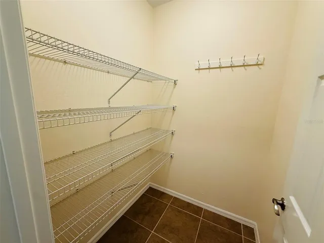 a bathroom with a shower and a shower head