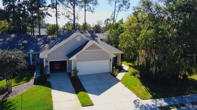 a house view with a garden space