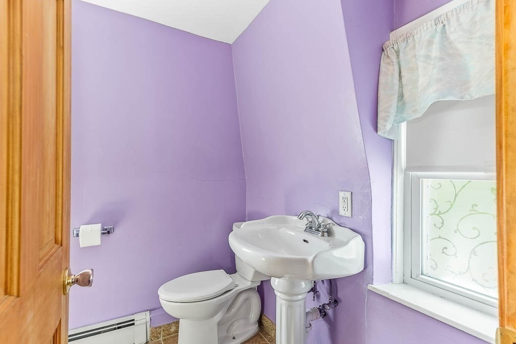 29 Berkeley Road Dedham, MA 02026 - Photo 21 of 35 a bathroom with a sink and toilet