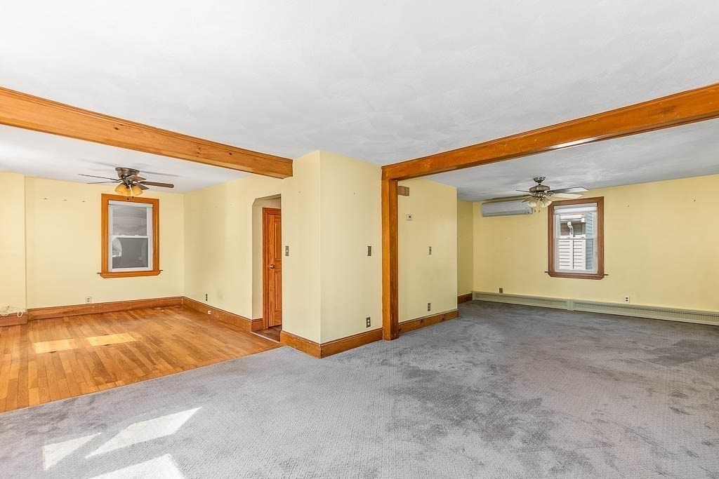 29 Berkeley Road Dedham, MA 02026 - Photo 7 of 35 a view of an empty room with window