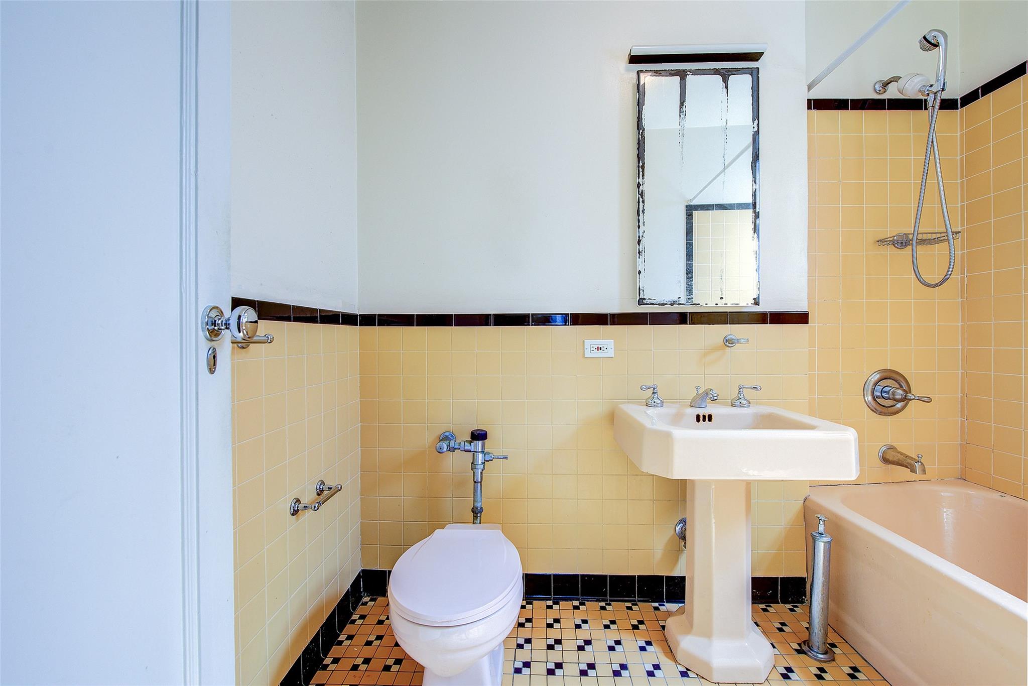 117-01 Park Lane South, Unit C5D Queens, NY 11418 - Photo 23 of 33 a bathroom with a sink toilet and shower