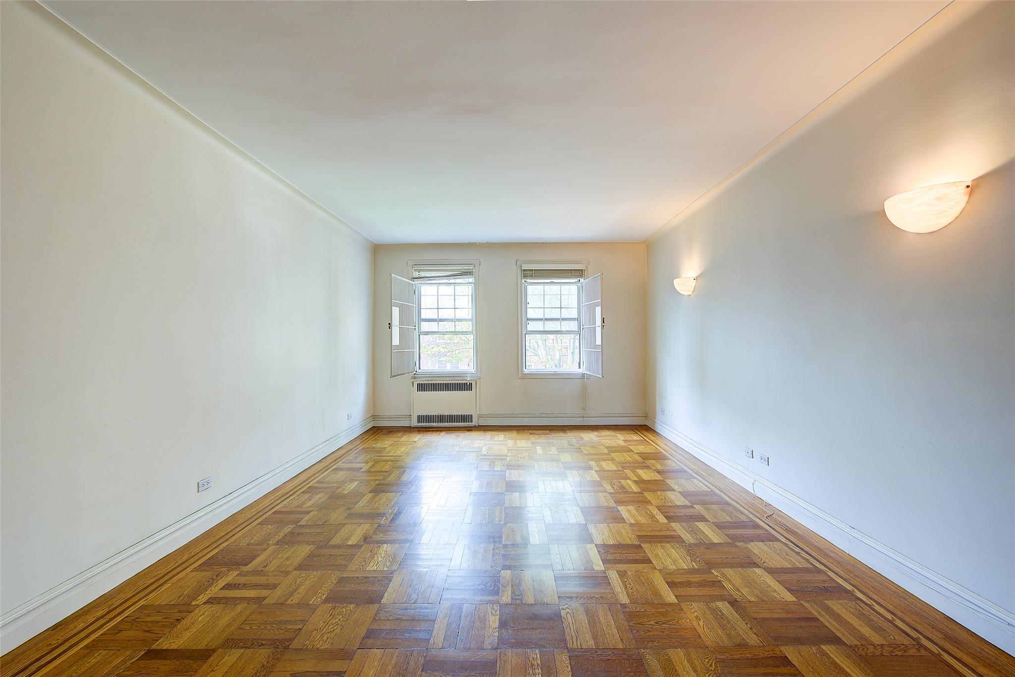 117-01 Park Lane South, Unit C5D Queens, NY 11418 - Photo 5 of 33 a view of empty room with window
