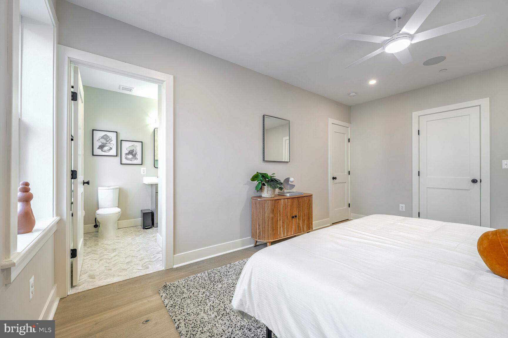 1820 19th Street Northwest, Unit 3 Washington, DC 20009 - Photo 19 of 27 a spacious bedroom with a bed and a view of bathroom