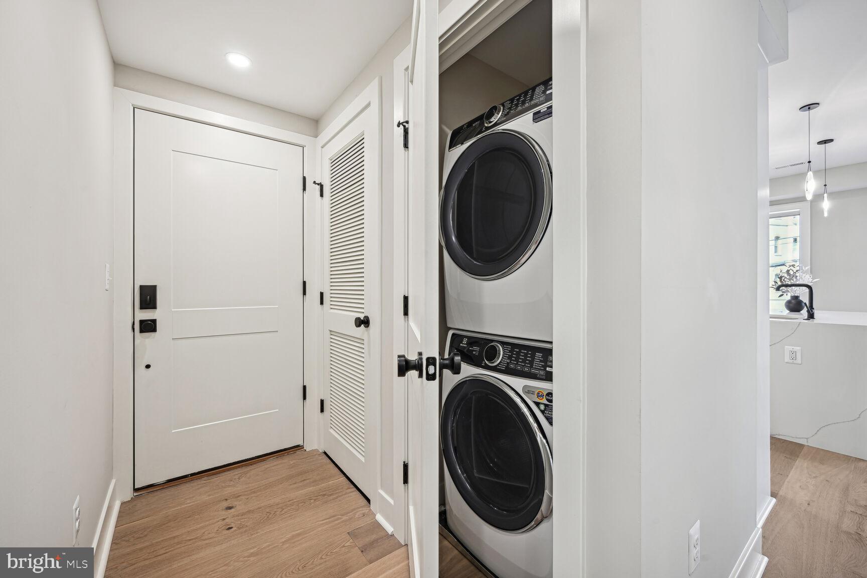 1820 19th Street Northwest, Unit 3 Washington, DC 20009 - Photo 24 of 27 a view of a hallway with washer and dryer