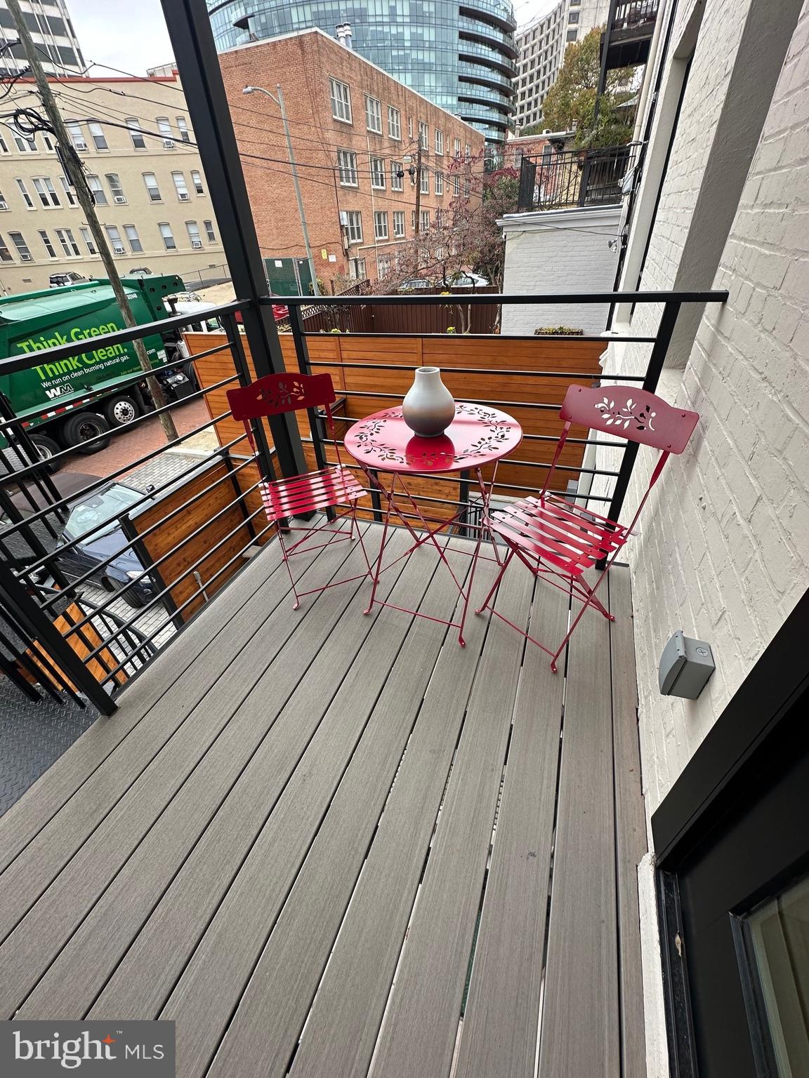 1820 19th Street Northwest, Unit 3 Washington, DC 20009 - Photo 25 of 27 a outdoor sitting area with furniture and wooden floor