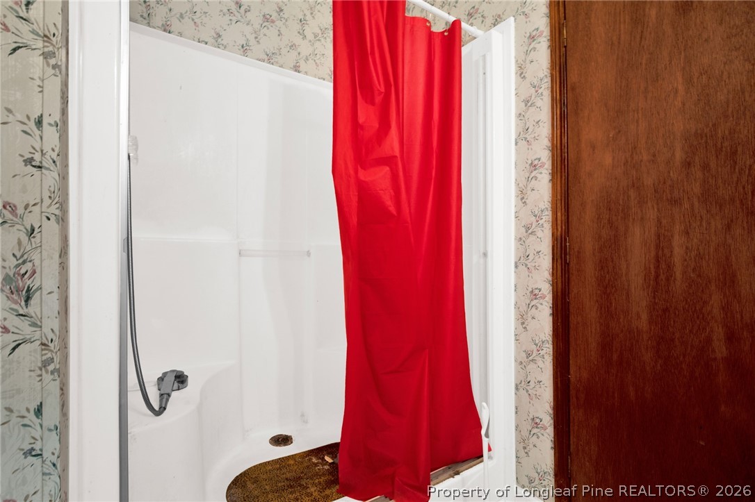 4705 Hickory Ridge Road Parkton, NC 28371 - Photo 23 of 37 a close up of a shower curtain