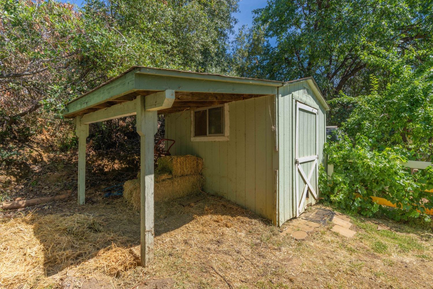 18301 Toyon Road Pine Grove, CA 95665 - Photo 12 of 15 a backyard of a house with lots of green space