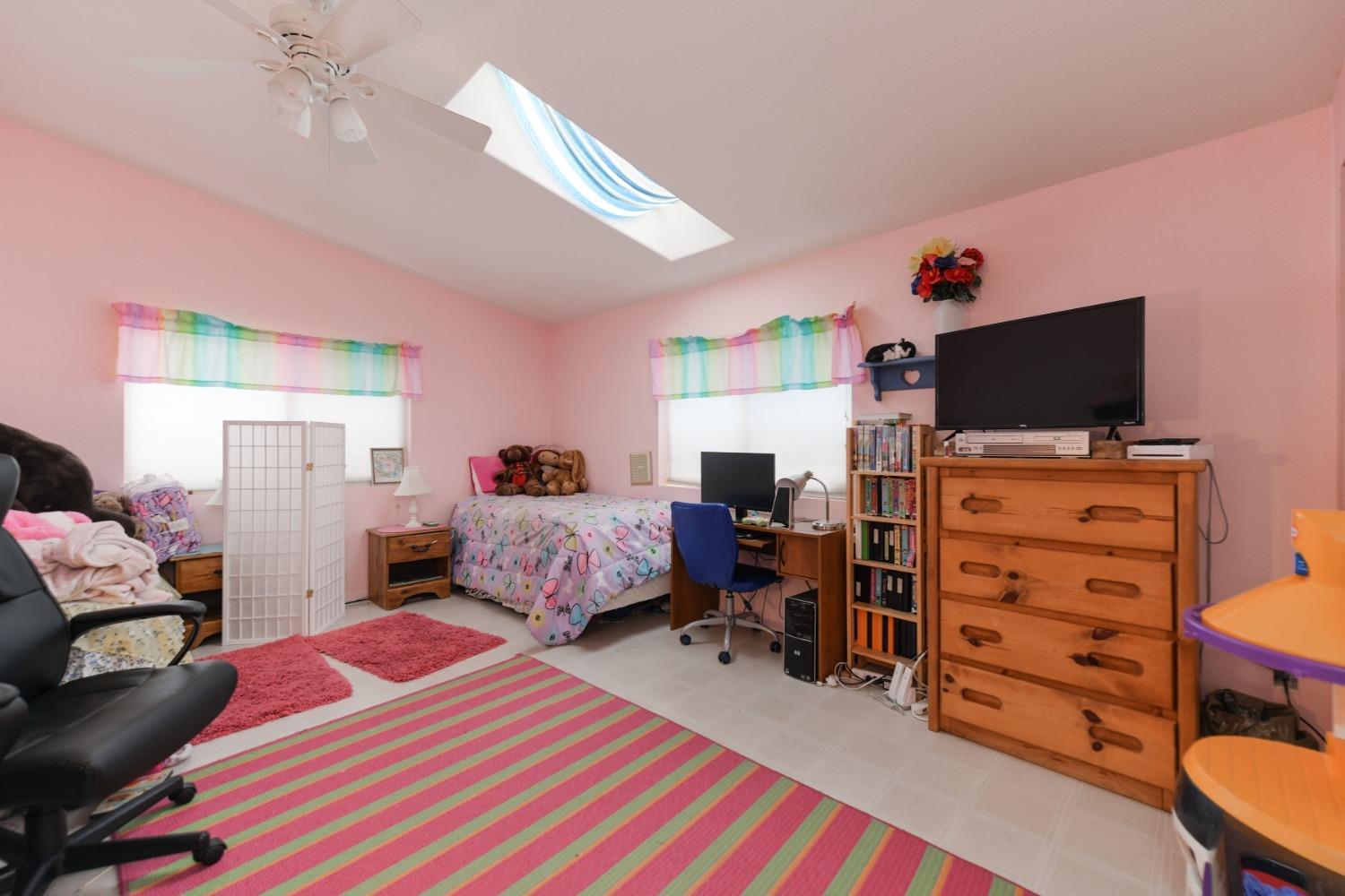 18301 Toyon Road Pine Grove, CA 95665 - Photo 10 of 15 a bedroom with a bed and furniture