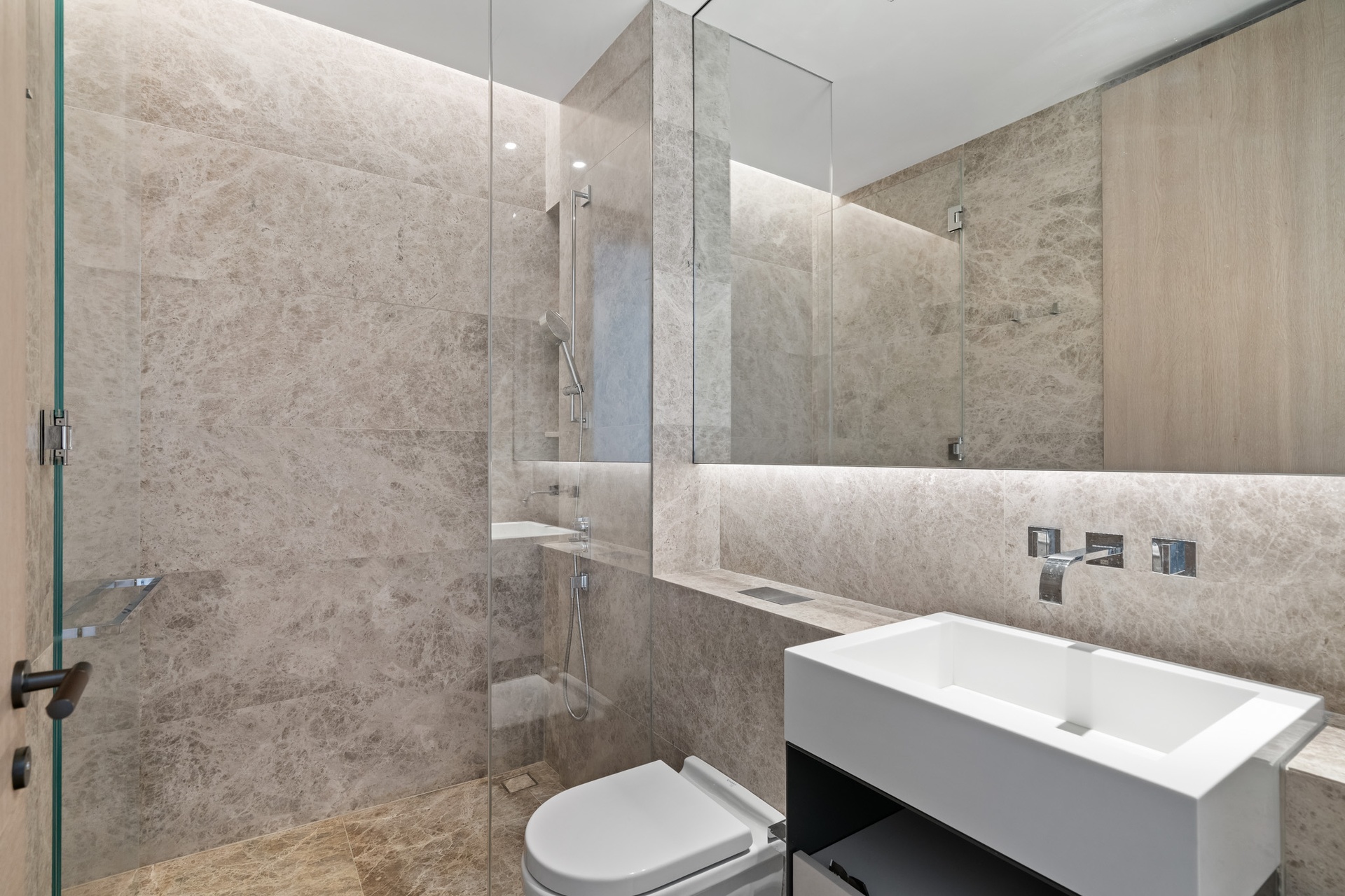 522 West 29th Street, Unit 5B Manhattan, NY 10001 - Photo 15 of 21 a bathroom with a sink toilet and shower