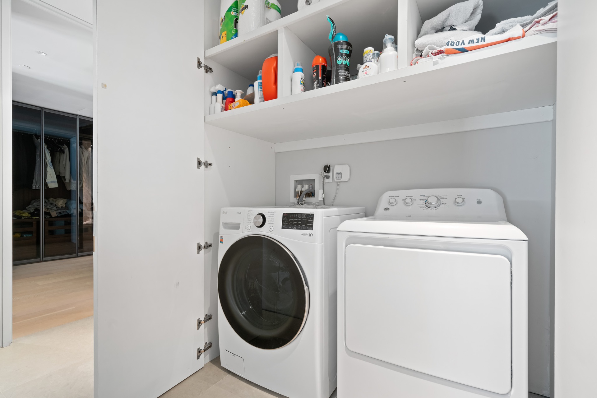 522 West 29th Street, Unit 5B Manhattan, NY 10001 - Photo 18 of 21 a utility room with dryer and washer