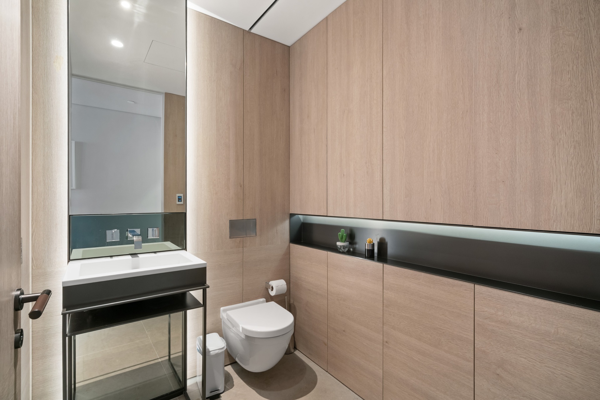 522 West 29th Street, Unit 5B Manhattan, NY 10001 - Photo 19 of 21 a bathroom with a toilet a sink and a mirror