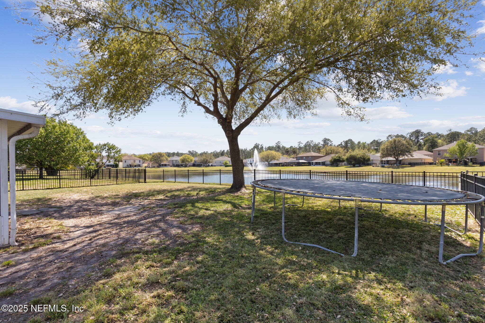 76564 Longleaf Loop Yulee, FL 32097 - Photo 2 of 54 a view of a park with large trees