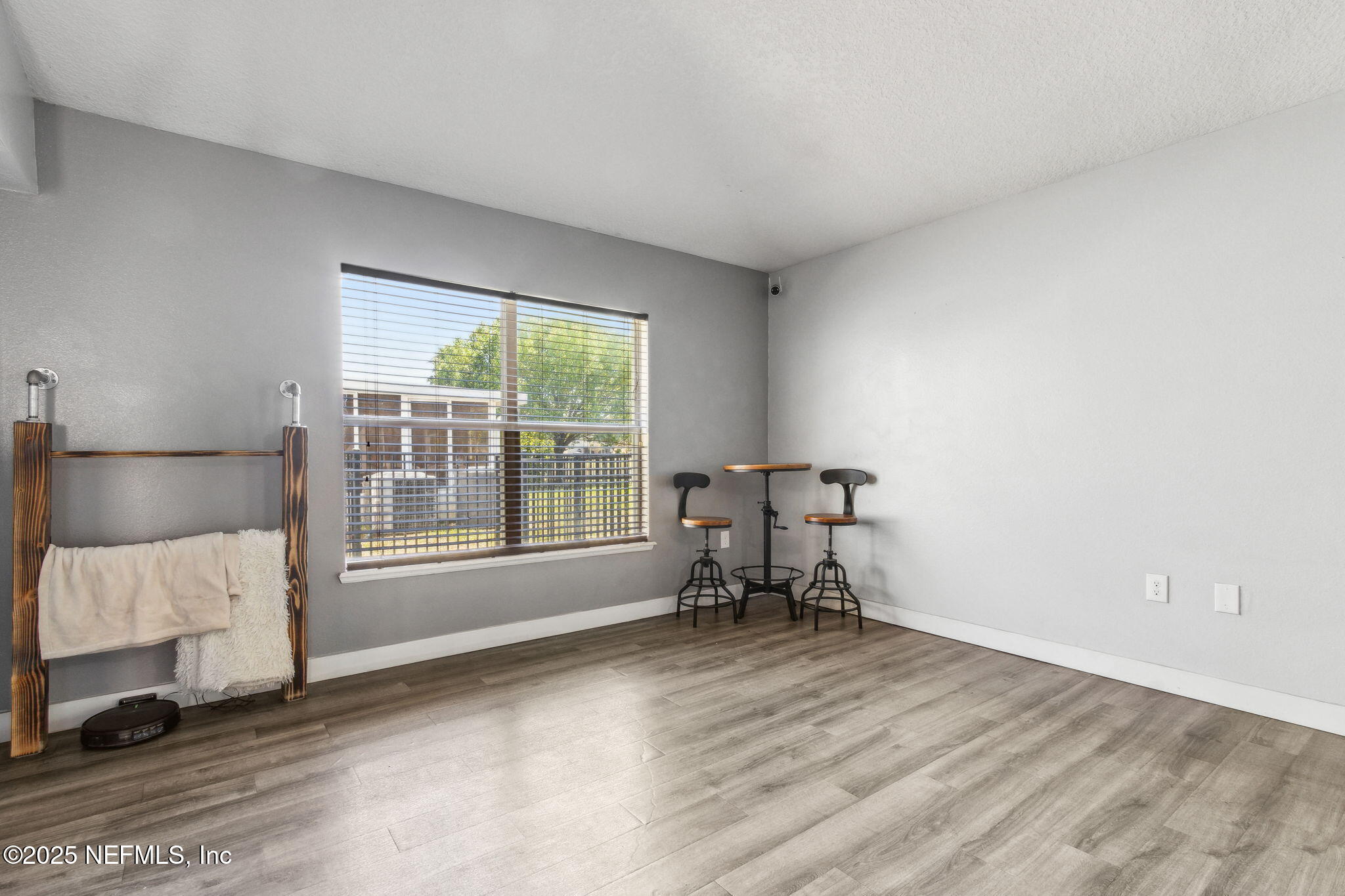 76564 Longleaf Loop Yulee, FL 32097 - Photo 28 of 54 a living room with furniture and a window