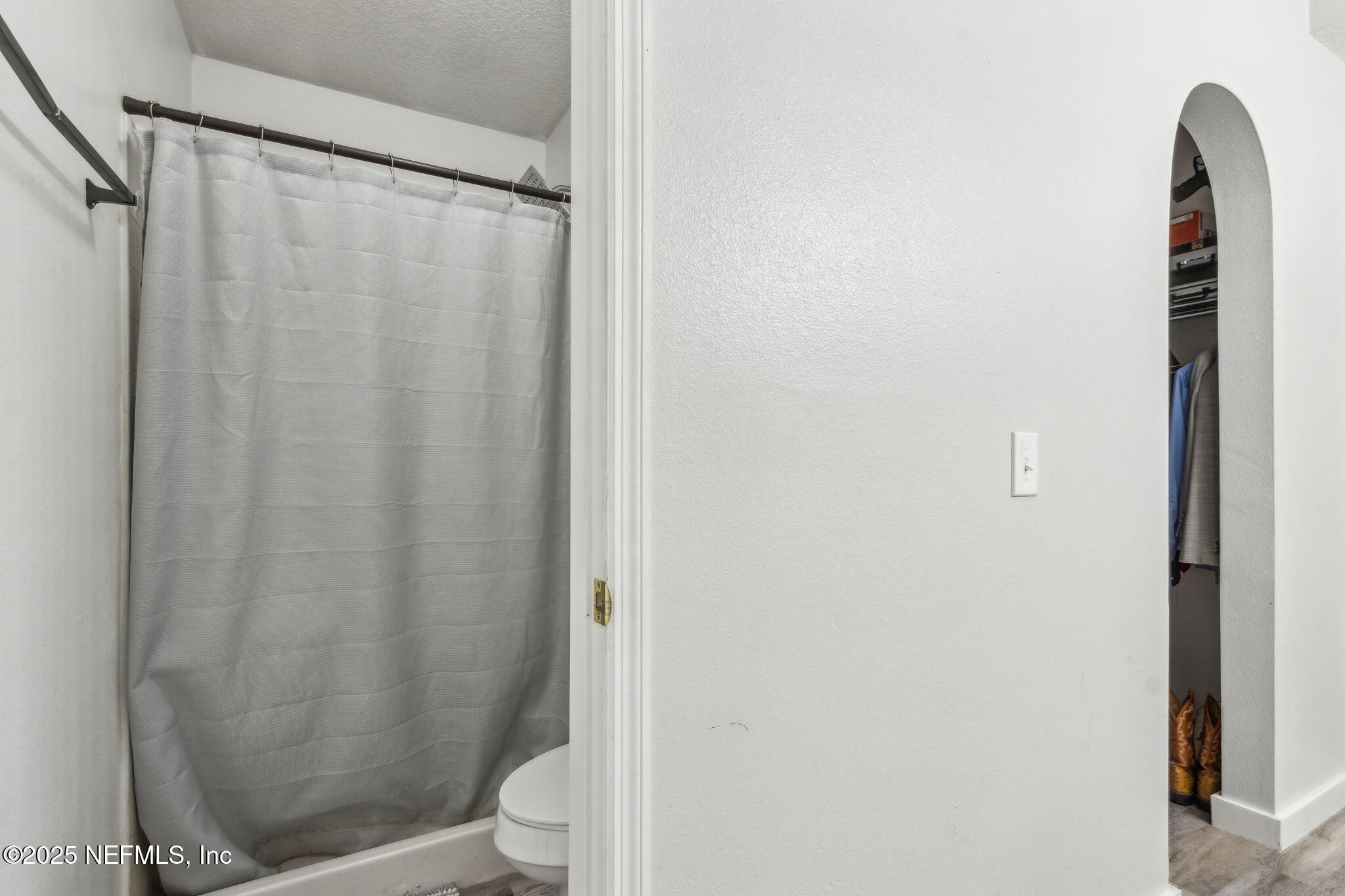 76564 Longleaf Loop Yulee, FL 32097 - Photo 36 of 54 a bathroom with a shower and a toilet