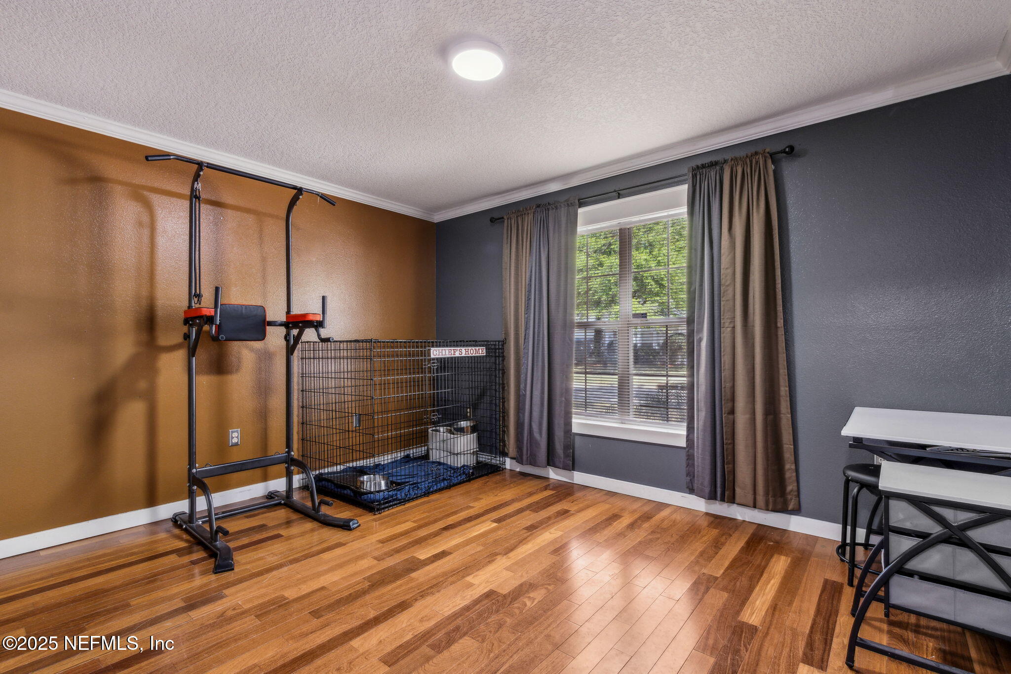 76564 Longleaf Loop Yulee, FL 32097 - Photo 37 of 54 a view of a room with gym equipment