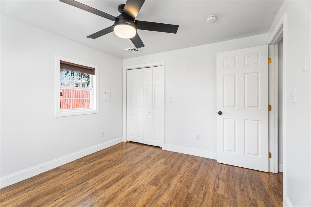 32 Shaw Road Brockton, MA 02301 - Photo 13 of 27 a view of empty room with wooden floor