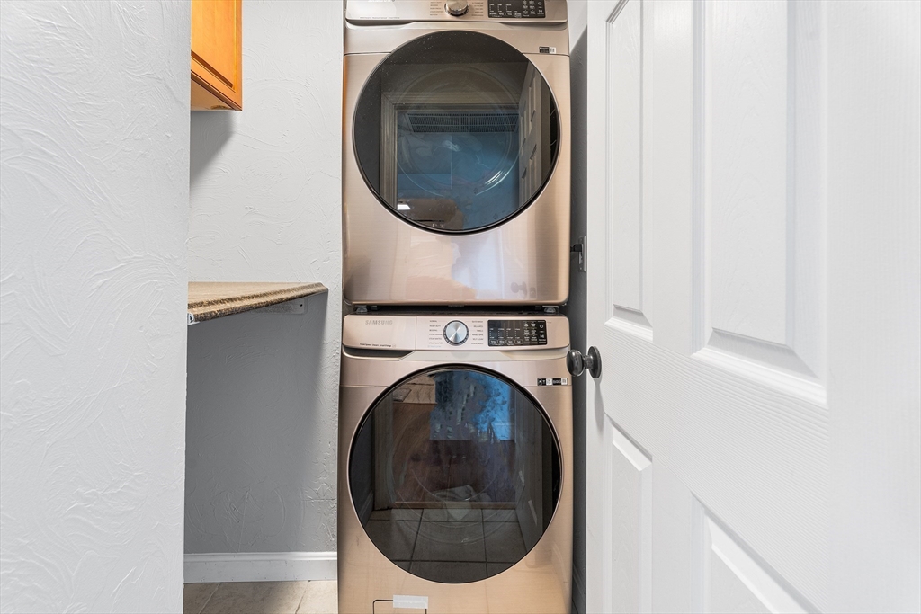 32 Shaw Road Brockton, MA 02301 - Photo 15 of 27 a utility room with dryer and washer