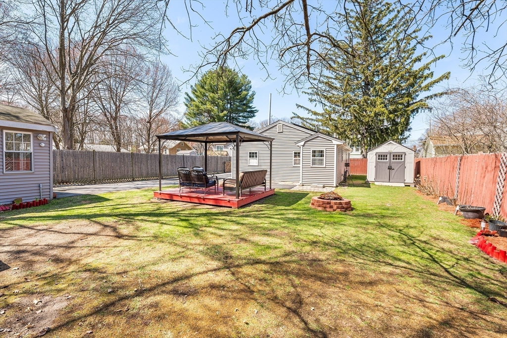 32 Shaw Road Brockton, MA 02301 - Photo 20 of 27 a view of a house with pool and a yard