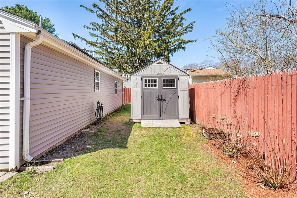 32 Shaw Road Brockton, MA 02301 - Photo 25 of 27 a view of a back yard of the house