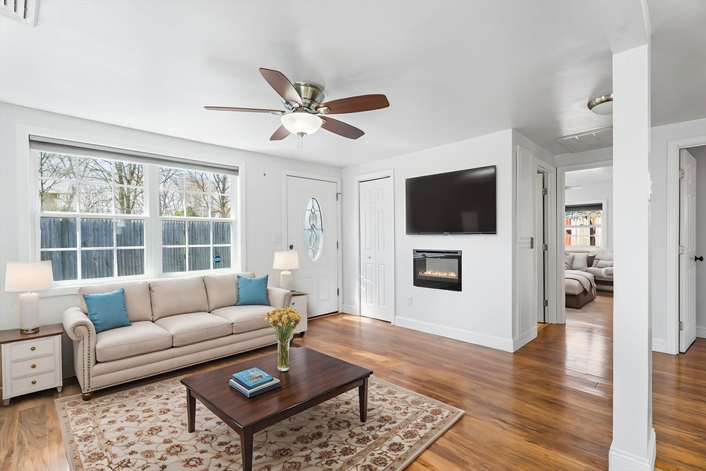 32 Shaw Road Brockton, MA 02301 - Photo 4 of 27 a living room with furniture and a flat screen tv